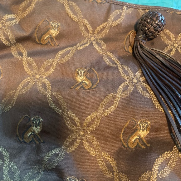 Tommy Bahama purse. 12 x 1 1/2 x 10. Suede interior with some use. - Picture 2 of 3